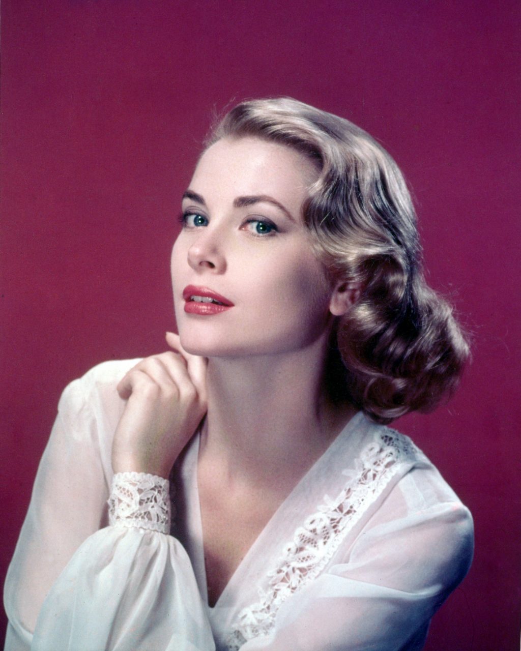 Grace Kelly in a lace-trimmed top, circa 1955.