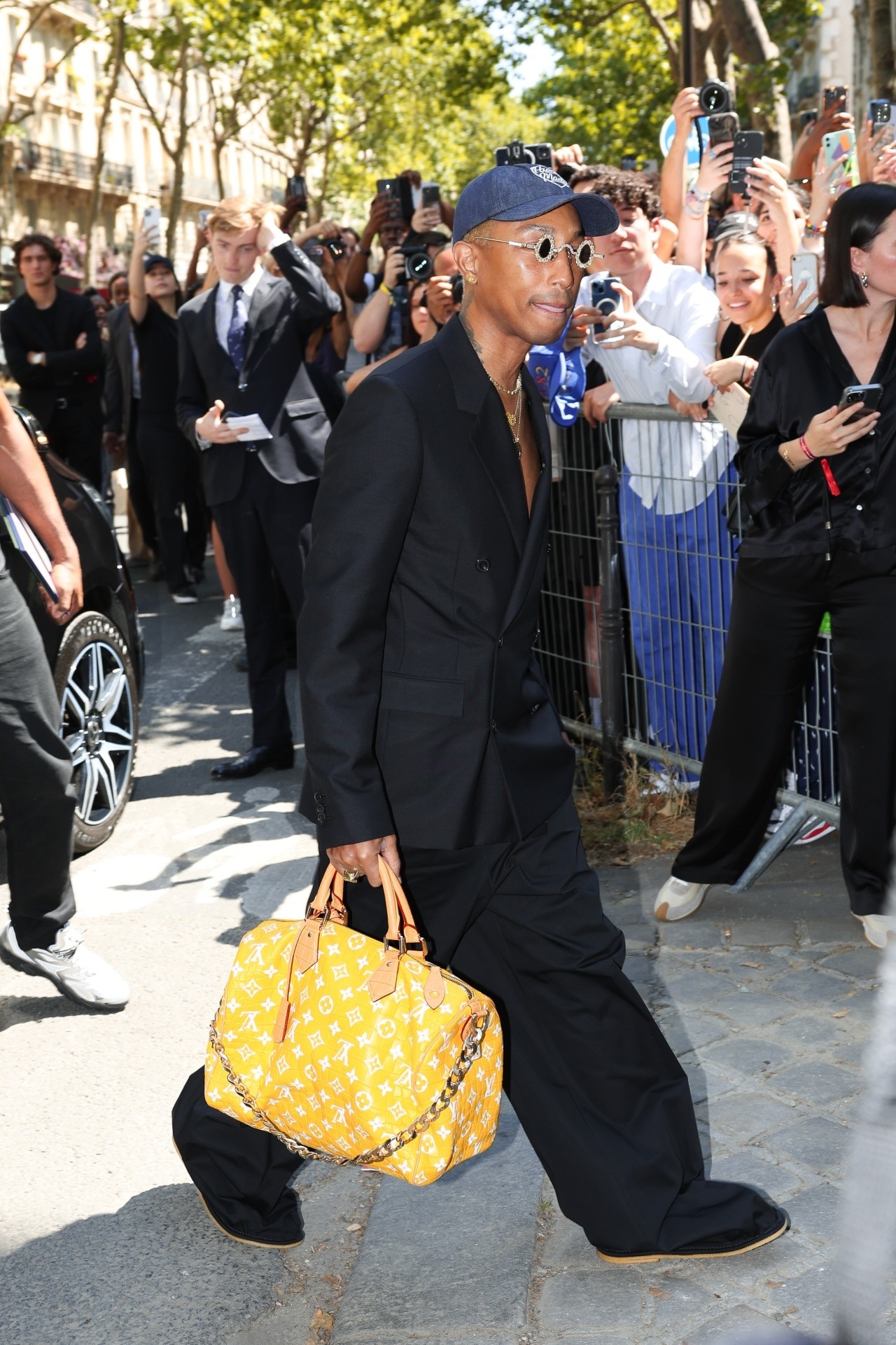 21metgala on X: Helen Lasichanh and Pharrell Williams attends the Junya  Watanabe Man Menswear Spring/Summer 2024 show.  / X